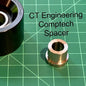 Comptech spacer for MercRacing tensioner pulley